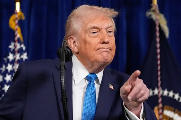President Donald Trump threatens 25% tariff against any country that trades with Iran